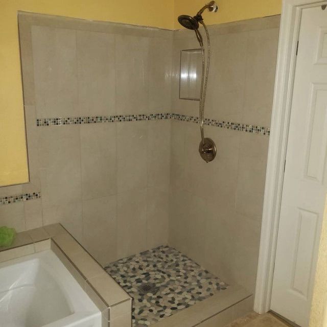 Black Forest Tile Artistry: Custom Shower Pans and Rustic-Luxury Remodels